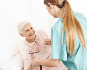 Alzheimer's and Dementia patient being helped by a caregiver