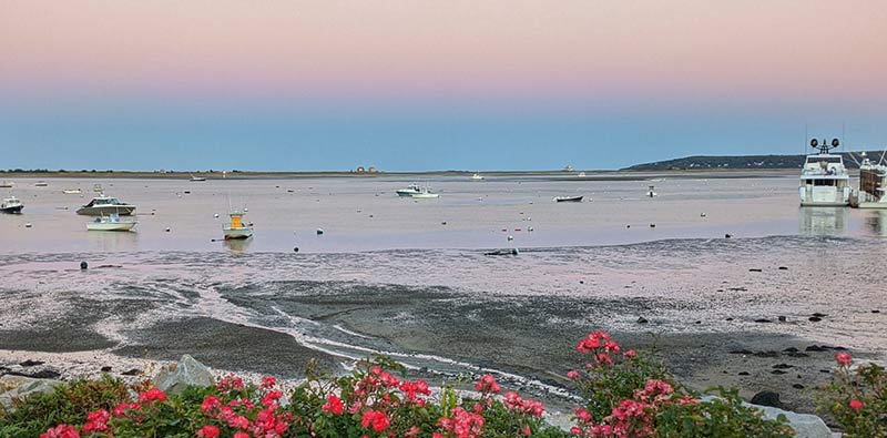 photo of a seashore at sunset in plymouth county ma