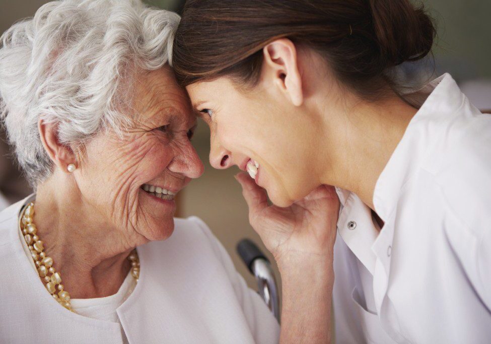 Kindness is showing someone you care - Cahoon Care Associates elderly woman thanking her home caregiver